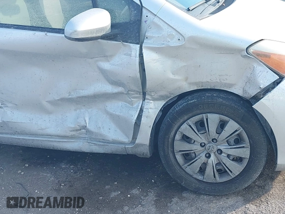 2014 Toyota Yaris L with VIN JTDJTUD33ED592307, listed as a IAAI auction lot 41418409 with 91,209 mi miles and . Bid and sale history available at DreamBid. Image 6.