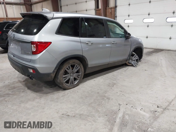 2021 Honda Passport EX-L with VIN 5FNYF8H56MB000107, listed as a IAAI auction lot 41868429 with 66,572 mi miles and . Bid and sale history available at DreamBid. Image 4.