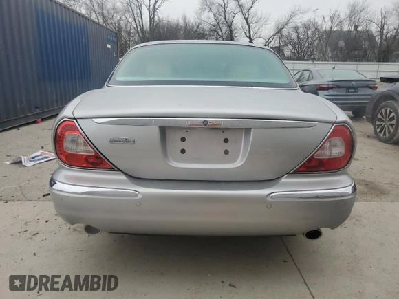 2004 Jaguar XJ with VIN SAJEA74C64SG08121, listed as a Copart auction lot 81736984 with 100,144 mi miles and Non Repairable. Bid and sale history available at DreamBid. Image 6.