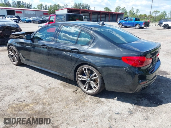 2019 BMW 5 Series M550i xDrive with VIN WBAJB9C51KB289355, listed as a IAAI auction lot 41867984 with 30,106 mi miles and . Bid and sale history available at DreamBid. Image 3.