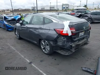 2018 Honda Clarity Plug-In Hybrid with VIN JHMZC5F14JC017006, listed as a IAAI auction lot 42064754 with 36,976 mi miles. Bid and sale history available at carsss.com. Image 3.
