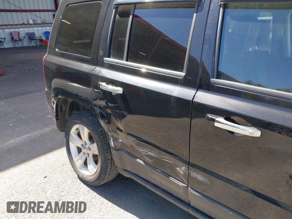 2015 Jeep Patriot High Altitude with VIN 1C4NJRFB4FD425660, listed as a IAAI auction lot 41821761 with 90,774 mi miles and . Bid and sale history available at carsss.com. Image 6.