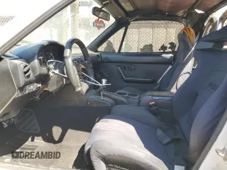 1990 Mazda MX-5 Miata z VIN JM1NA3511L0106323, wystawiony jako Copart lot #50449685 z przebiegiem 179 018 mil mil oraz Szkoda całkowita • Salvage title. Historia ofert i sprzedaży dostępna na DreamBid. Obrazek 7.