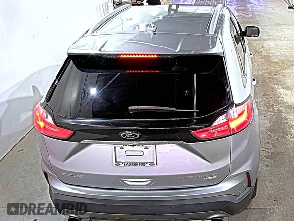 2020 Ford Edge Titanium with VIN 2FMPK3K95LBA30678, listed as a IAAI auction lot 42714178 with 60,935 mi miles and . Bid and sale history available at DreamBid. Image 2.