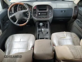 2001 Mitsubishi Montero Limited z VIN JA4MW51R71J038583, wystawiony jako Copart lot #83024384 z przebiegiem 157 538 mil mil oraz Szkoda całkowita • Salvage title. Historia ofert i sprzedaży dostępna na DreamBid. Obrazek 8.