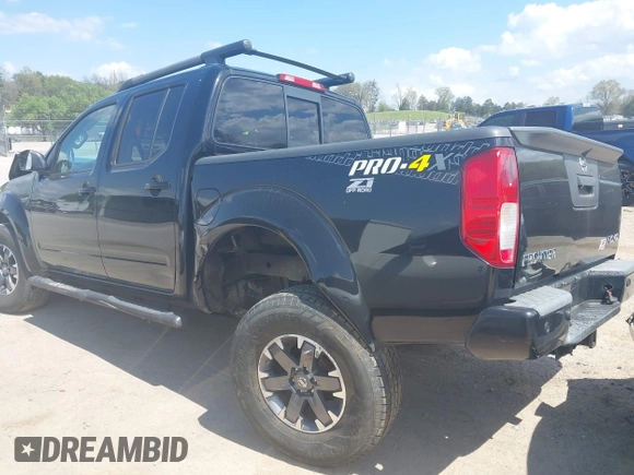 2014 Nissan Frontier SV with VIN 1N6AD0EV0EN758585, listed as a IAAI auction lot 41943169 with 186,214 mi miles and . Bid and sale history available at DreamBid. Image 3.