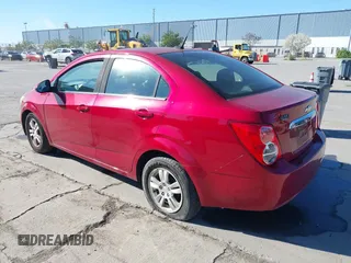 2013 Chevrolet Sonic LT with VIN 1G1JC5SB2D4115715, listed as a IAAI auction lot 41870815 with 137,786 mi miles and . Bid and sale history available at DreamBid. Image 3.