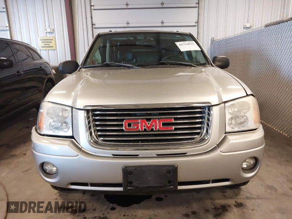 2006 GMC Envoy SLT with VIN 1GKDT13S262285832, listed as a IAAI auction lot 41794016 with 177,814 mi miles and . Bid and sale history available at DreamBid. Image 13.