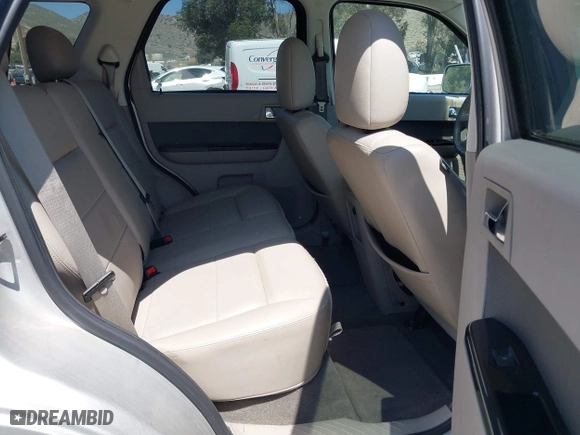 2009 Ford Escape Hybrid with VIN 1FMCU49309KC11542, listed as a IAAI auction lot 42028593 with 168,573 mi miles. Bid and sale history available at carsss.com. Image 8.