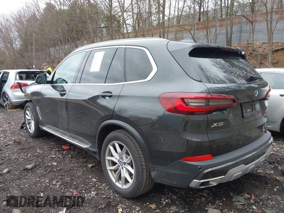 2023 BMW X5 xDrive40i with VIN 5UXCR6C07P9N61205, listed as a IAAI auction lot 42010313 with 34,127 mi miles. Bid and sale history available at carsss.com. Image 3.