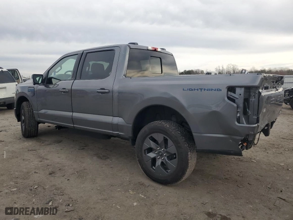 2024 Ford F-150 Lightning LARIAT with VIN 1FT6W5L79RWG19060, listed as a Copart auction lot 43415085 with 2,733 mi miles and Salvage Title. Bid and sale history available at carsss.com. Image 2.