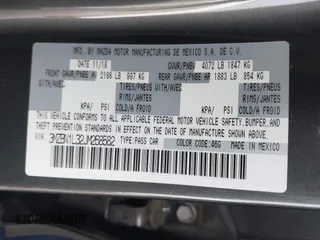 2018 Mazda 3 Touring with VIN 3MZBN1L32JM268582, listed as a IAAI auction lot 42072435 with 61,417 mi miles. Bid and sale history available at carsss.com. Image 9.