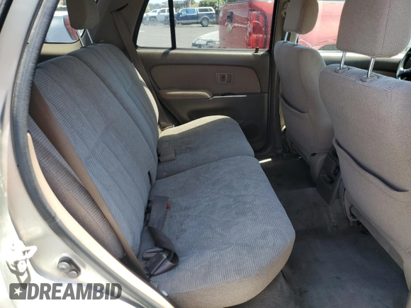 2000 Toyota 4Runner SR5 z VIN JT3GN86R0Y0154518, wystawiony jako Copart lot #60098695 z przebiegiem 174 071 mil mil oraz Szkoda całkowita • Salvage title. Historia ofert i sprzedaży dostępna na DreamBid. Obrazek 11.