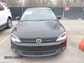 2012 Volkswagen Jetta TDI w/Premium with VIN 3VWLL7AJ9CM367840, listed as a IAAI auction lot 41868444 with 176,486 mi miles and . Bid and sale history available at DreamBid. Image 6.