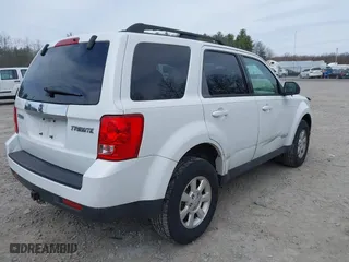2008 Mazda Tribute Touring with VIN 4F2CZ961X8KM28763, listed as a IAAI auction lot 42048490 with 158,361 mi miles. Bid and sale history available at carsss.com. Image 4.