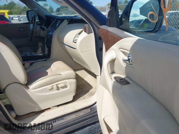 2015 Infiniti QX80 z VIN JN8AZ2NC8F9370971, wystawiony jako IAAI lot #40405096 z przebiegiem 71 990 mil mil oraz . Historia ofert i sprzedaży dostępna na DreamBid. Obrazek 5.