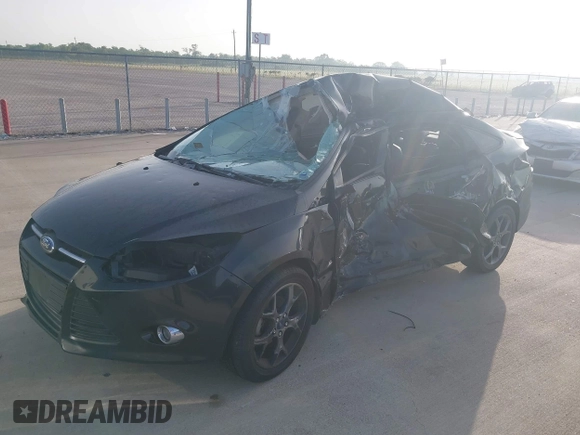 2013 Ford Focus SE z VIN 1FADP3F20DL361861, wystawiony jako IAAI lot #42652227 z przebiegiem 104 502 mil mil oraz . Historia ofert i sprzedaży dostępna na DreamBid. Obrazek 6.