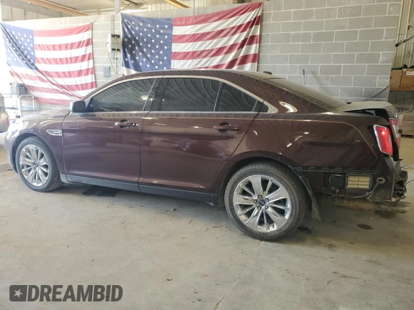2010 Ford Taurus Limited with VIN 1FAHP2FWXAG138150, listed as a Copart auction lot 53135915 with 95,720 mi miles and Salvage Title. Bid and sale history available at carsss.com. Image 2.