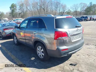 2012 Kia Sorento LX with VIN 5XYKTDA25CG235127, listed as a IAAI auction lot 41804019 with 176,000 mi miles. Bid and sale history available at carsss.com. Image 3.