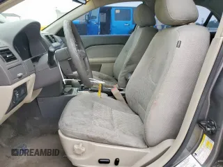 2012 Ford Fusion SE z VIN 3FAHP0HA9CR226737, wystawiony jako Copart lot #57229835 z przebiegiem 204 811 mil mil oraz Szkoda całkowita • Salvage title. Historia ofert i sprzedaży dostępna na DreamBid. Obrazek 7.
