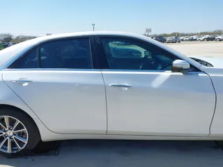 2017 Cadillac CTS Luxury RWD with VIN 1G6AR5SS7H0145637, listed as a IAAI auction lot 41689827 with 54,576 mi miles and . Bid and sale history available at DreamBid. Image 14.