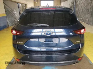 2021 Mazda CX-5 Touring with VIN JM3KFACMXM0334139, listed as a Copart auction lot 55362905 with 117,279 mi miles and Clean Title. Bid and sale history available at DreamBid. Image 6.
