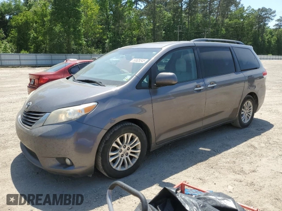 2014 Toyota Sienna XLE with VIN 5TDYK3DC6ES473747, listed as a Copart auction lot 53828345 with 251,390 mi miles and Clean Title. Bid and sale history available at carsss.com. Image 1.