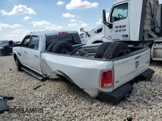 2015 Ram 3500 Laramie with VIN 3C63RRJL1FG625356, listed as a Copart auction lot 73058614 with 198,702 mi miles and Salvage Title. Bid and sale history available at carsss.com. Image 2.
