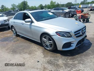 2017 Mercedes-Benz E 300 Luxury z VIN WDDZF4JB6HA157444, wystawiony jako IAAI lot #42109448 z przebiegiem 98 676 mil mil oraz . Historia ofert i sprzedaży dostępna na DreamBid. Obrazek 1.