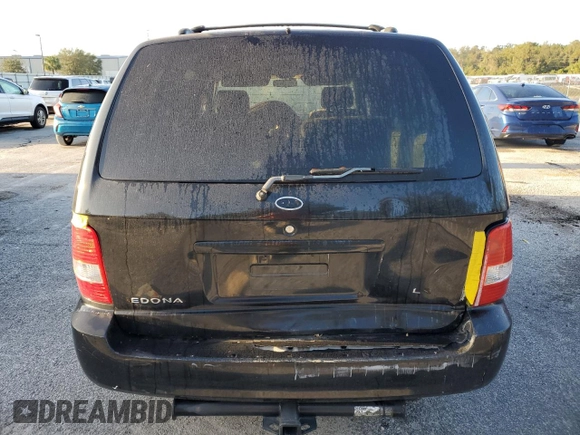 2005 Kia Sedona LX with VIN KNDUP131056640057, listed as a Copart auction lot 72153844 with 192,136 mi miles and Salvage Title. Bid and sale history available at carsss.com. Image 6.