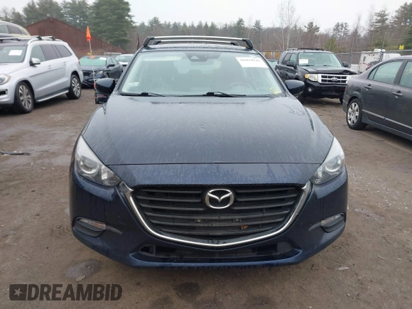 2018 Mazda 3 Touring with VIN 3MZBN1L34JM204883, listed as a IAAI auction lot 41094541 with 125,205 mi miles and . Bid and sale history available at DreamBid. Image 12.