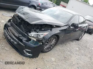 2018 Infiniti Q50 Luxe with VIN JN1EV7APXJM353659, listed as a IAAI auction lot 39289470 with 124,830 mi miles and . Bid and sale history available at DreamBid. Image 21.