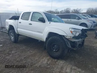 2015 Toyota Tacoma with VIN 5TFLU4EN7FX127826, listed as a IAAI auction lot 41549196 with 166,871 mi miles. Bid and sale history available at carsss.com. Image 1.
