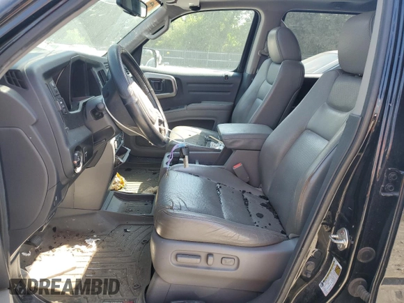 2013 Honda Ridgeline RTL with VIN 5FPYK1F58DB018136, listed as a Copart auction lot 61720925 with 184,020 mi miles and Salvage title. Bid and sale history available at DreamBid. Image 7.