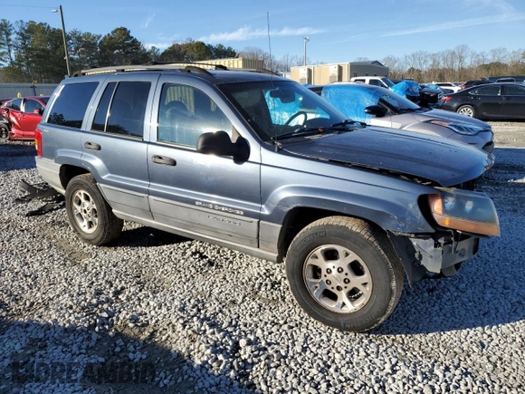 2001 Jeep Grand Cherokee Laredo z VIN 1J4GW48S91C578800, wystawiony jako Copart lot #87934695 z przebiegiem 250 784 mil mil oraz Szkoda całkowita • Salvage title. Historia ofert i sprzedaży dostępna na DreamBid. Obrazek 4.