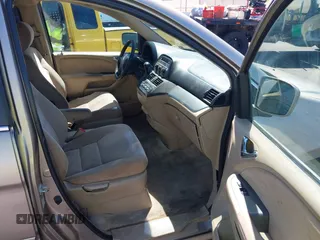 2007 Honda Odyssey EX z VIN 5FNRL38407B123509, wystawiony jako IAAI lot #42238353 z przebiegiem 200 111 mil mil oraz . Historia ofert i sprzedaży dostępna na DreamBid. Obrazek 5.