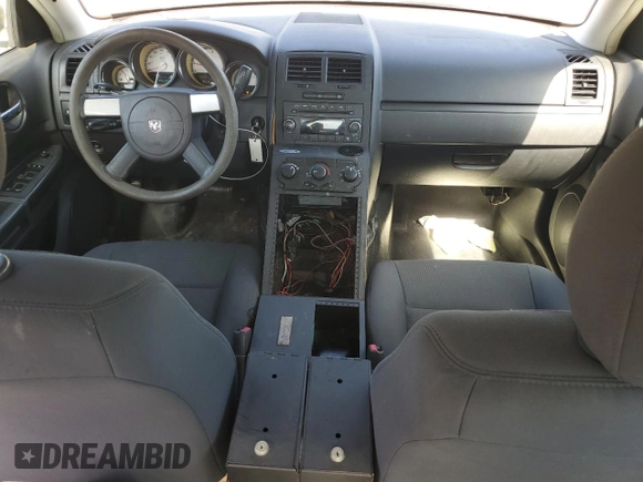 2010 Dodge Charger Police with VIN 2B3AA4CT2AH203453, listed as a Copart auction lot 69824824 with 195,153 mi miles and Salvage Title. Bid and sale history available at DreamBid. Image 8.