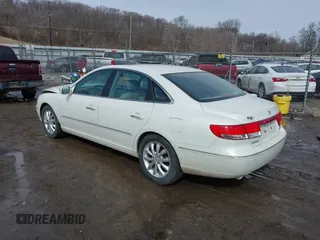 2007 Hyundai Azera SE z VIN KMHFC46F57A178118, wystawiony jako IAAI lot #41653806 z przebiegiem 104 221 mil mil oraz . Historia ofert i sprzedaży dostępna na DreamBid. Obrazek 3.