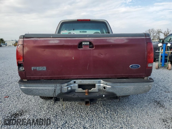1998 Ford F-150 with VIN 1FTZX1720WNB71052, listed as a Copart auction lot 88342915 with 275,131 mi miles and Salvage title. Bid and sale history available at DreamBid. Image 6.