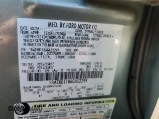 2006 Ford Freestyle SE z VIN 1FMZK01186GA52299, wystawiony jako Copart lot #55414125 z przebiegiem 146 604 mil mil oraz Tytuł czysty. Historia ofert i sprzedaży dostępna na DreamBid. Obrazek 13.