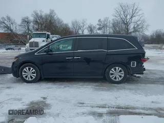 2015 Honda Odyssey EX-L with VIN 5FNRL5H60FB018030, listed as a IAAI auction lot 41608357 with 166,214 mi miles and . Bid and sale history available at carsss.com. Image 14.