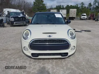 2017 MINI Hardtop 4 Door Cooper S z VIN WMWXU3C54H2D32602, wystawiony jako IAAI lot #41458333 z przebiegiem 124 235 mil mil oraz . Historia ofert i sprzedaży dostępna na DreamBid. Obrazek 12.