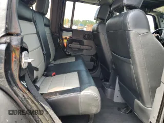 2008 Jeep Wrangler Unlimited Sahara with VIN 1J4GA59178L607960, listed as a Copart auction lot 57855995 with 122,913 mi miles and Salvage title. Bid and sale history available at DreamBid. Image 11.
