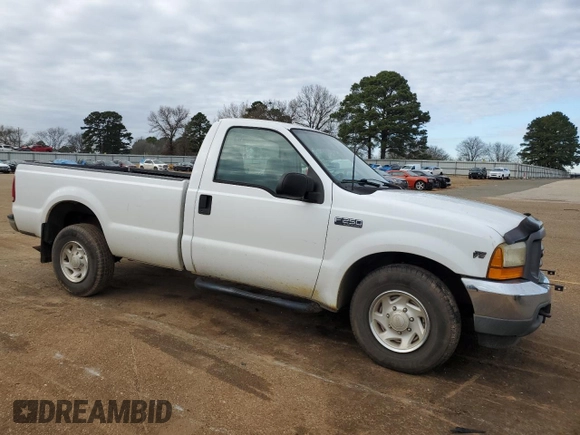 2001 Ford F-250 XL with VIN 1FTNF20L61EB61984, listed as a Copart auction lot 41397135 with 156,815 mi miles and Salvage title. Bid and sale history available at DreamBid. Image 4.