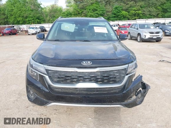 2021 Kia Seltos EX with VIN KNDERCAAXM7228380, listed as a IAAI auction lot 42015912 with 61,612 mi miles. Bid and sale history available at carsss.com. Image 13.