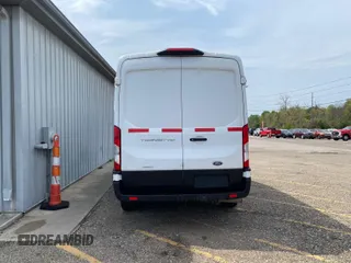 2020 Ford Transit Cargo with VIN 1FTBR1CG6LKA17312, listed as a IAAI auction lot 42284054 with 173,479 mi miles and . Bid and sale history available at DreamBid. Image 23.
