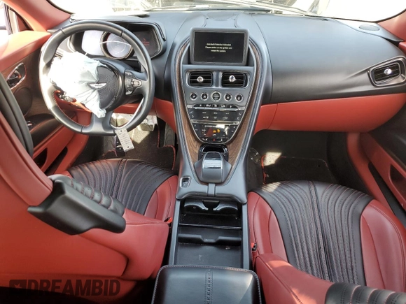 2018 Aston Martin DB11 z VIN SCFRMFAV8JGL03322, wystawiony jako Copart lot #86810004 z przebiegiem Nie podano mil oraz Szkody całkowita. Historia ofert i sprzedaży dostępna na DreamBid. Obrazek 8.