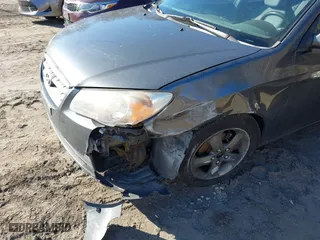 2007 Hyundai Elantra GLS with VIN KMHDU46D57U148215, listed as a IAAI auction lot 41702934 with 147,561 mi miles. Bid and sale history available at carsss.com. Image 6.