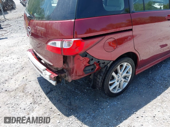 2012 Mazda 5 Grand Touring with VIN JM1CW2DL1C0123418, listed as a IAAI auction lot 42126956 with 112,411 mi miles and . Bid and sale history available at DreamBid. Image 21.