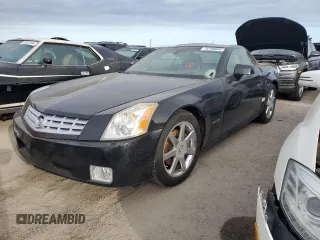 2005 Cadillac XLR z VIN 1G6YV34A955600425, wystawiony jako Copart lot #76188034 z przebiegiem Nie podano mil oraz Szkody całkowita. Historia ofert i sprzedaży dostępna na DreamBid. Obrazek 1.